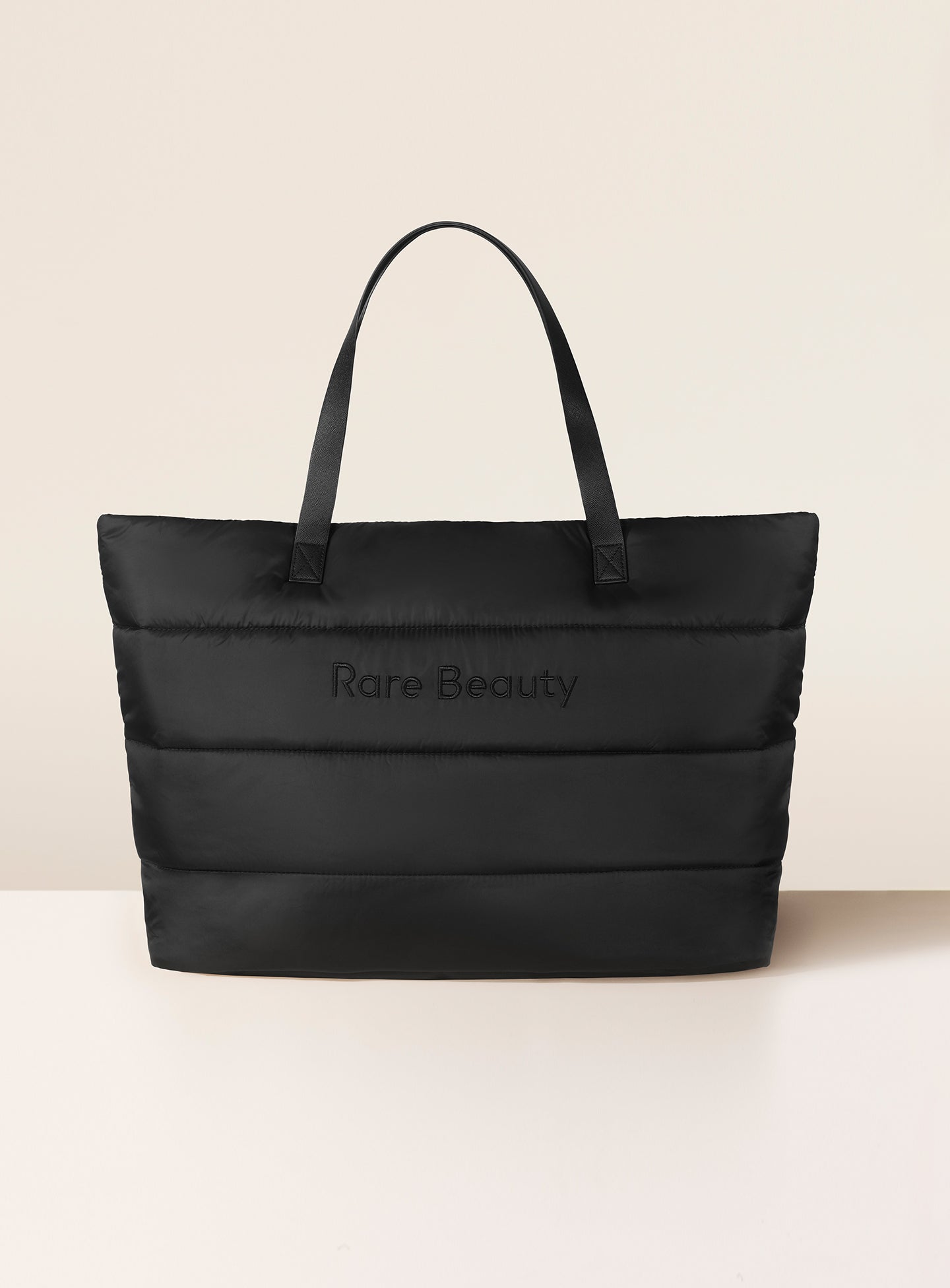 ecomm puffy tote traveler bag black.jpg ecomm puffy tote traveler bag black.jpg